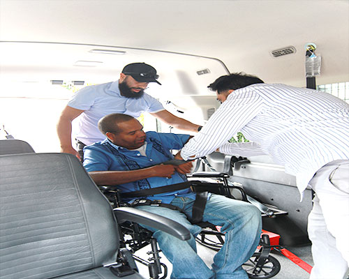 Two-Person Assist for Wheelchair Users on Ambulette Service